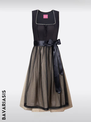 Elegance and variety in traditional costumes: gray dirndl, dirndl blouse Lochspitze and black and dirndl in focus