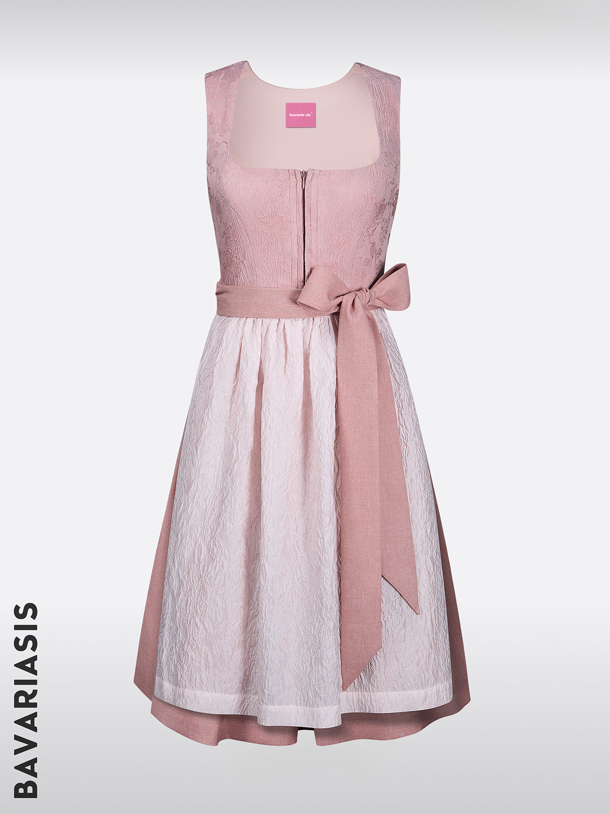 The variety of traditional costumes: gray dirndl, leather dirndl and dirndl with pink