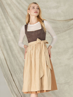 Tradition trifft Innovation: Das braune Dirndl als Symbol der neuen Ästhetik